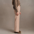 Anwen Khaki wide-leg pants shown from the side, highlighting the high rise and long straight line.