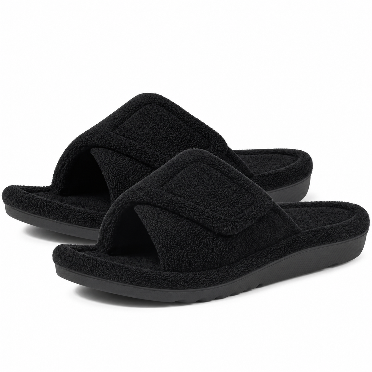 Aria Black slide slippers featuring a soft fuzzy upper, adjustable strap, open-toe design, and low-profile sole