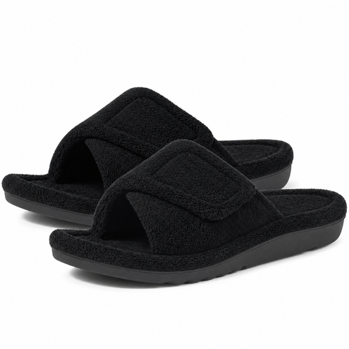 Aria Black slide slippers featuring a soft fuzzy upper, adjustable strap, open-toe design, and low-profile sole