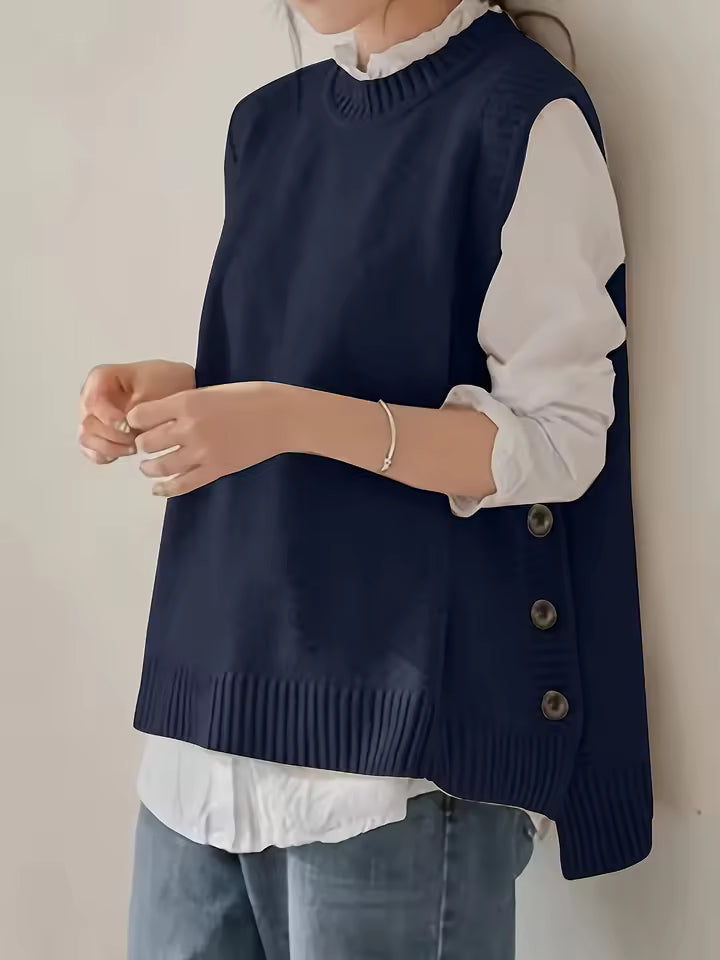 Audrey Blue knit sweater vest with crew neckline and decorative side buttons