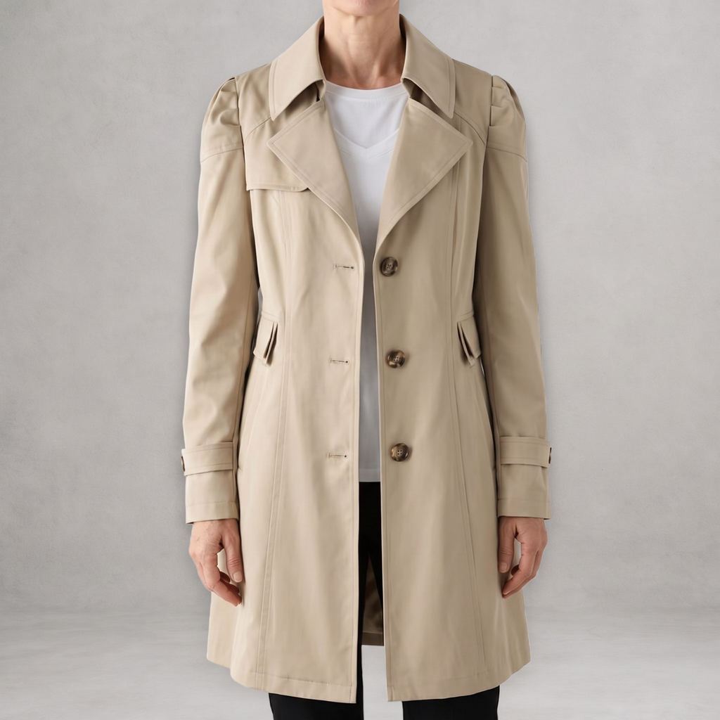 Front view of the Aurora Trench Coat with Belted Notch Collar in khaki, featuring wide notched lapels, a double-breasted button front, long sleeves, side pockets, and a straight mid-length silhouette. Designed by Bella Hudson.