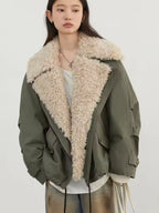 Avery oversized utility jacket featuring wide faux-shearling lapels, relaxed long sleeves, and layered front styling