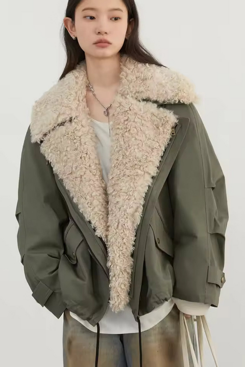 Avery oversized utility jacket featuring wide faux-shearling lapels, relaxed long sleeves, and layered front styling