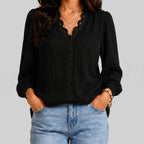 Front view of black boho button blouse with long sleeves and textured fabric by BELLA HUDSON