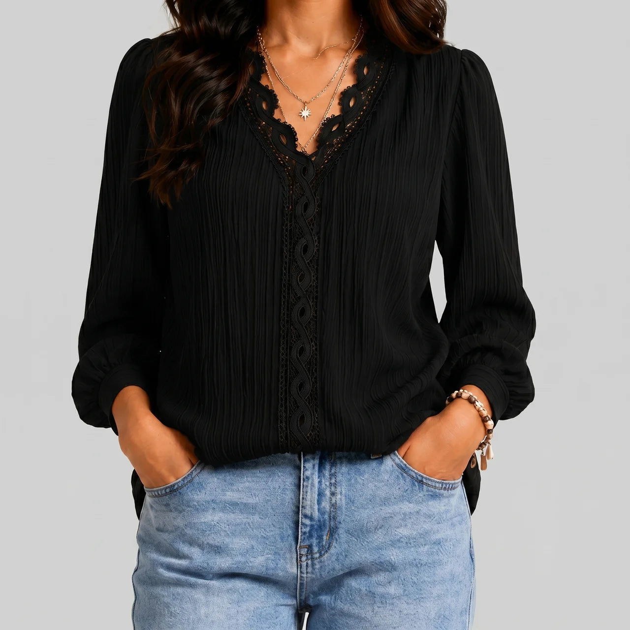 Front view of black boho button blouse with long sleeves and textured fabric by BELLA HUDSON