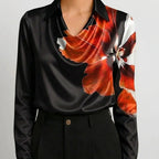 Black satin cowl neck blouse with red floral print front view BELLA HUDSON