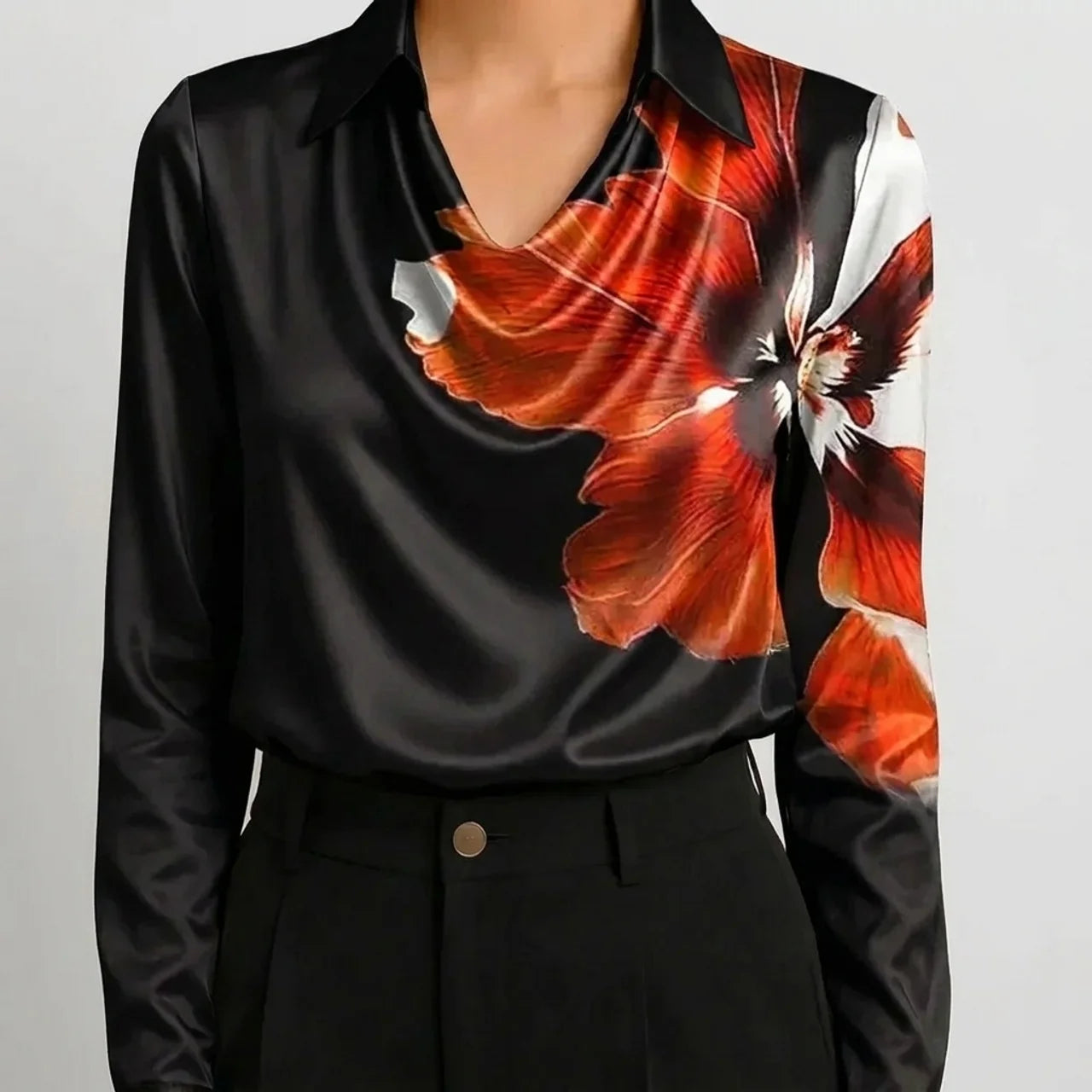 Black satin cowl neck blouse with red floral print front view BELLA HUDSON