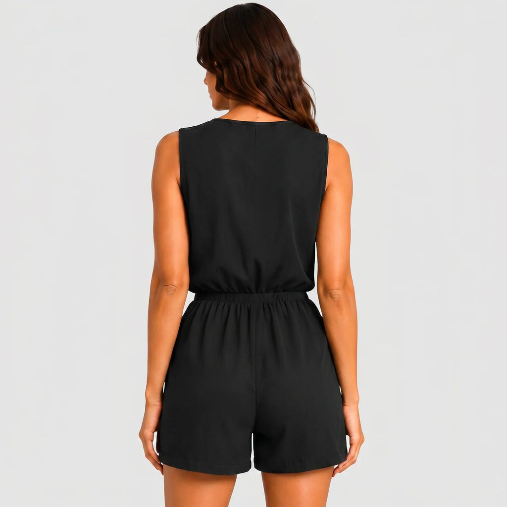 Back view of black sleeveless jumpsuit with elastic waist by BELLA HUDSON