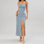 Front view of blue floral slit maxi dress with spaghetti straps and fitted silhouette by BELLA HUDSON