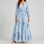 Front view of blue floral V-neck maxi dress with flowy silhouette by BELLA HUDSON