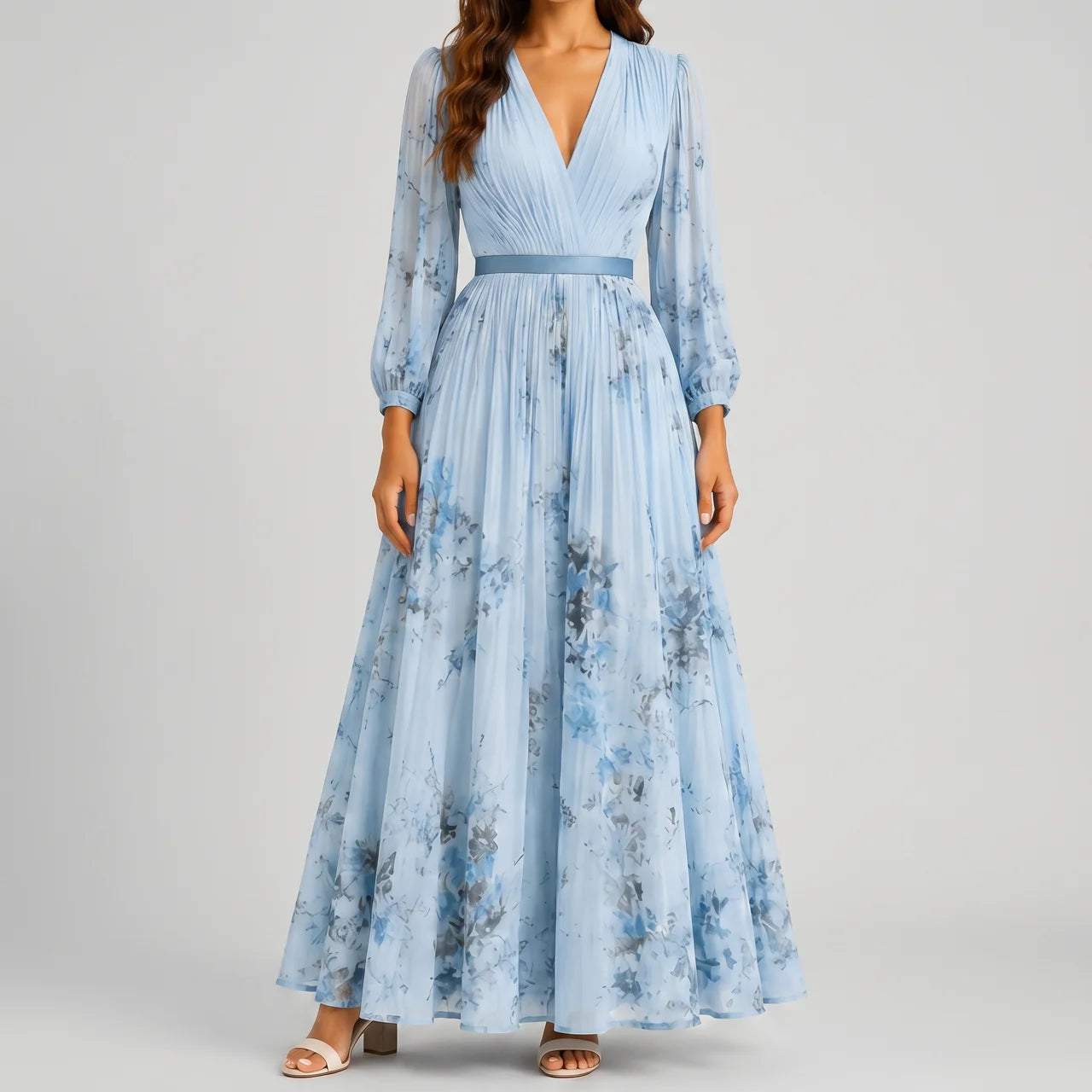 Front view of blue floral V-neck maxi dress with flowy silhouette by BELLA HUDSON