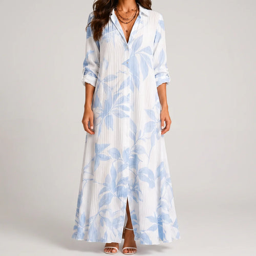 Front view of blue and white tropical print maxi dress with collar by BELLA HUDSON