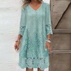 Front view of Light Green Bohemian Dress with Floral Embroidery and Delicate Lace Trim by BELLA HUDSON