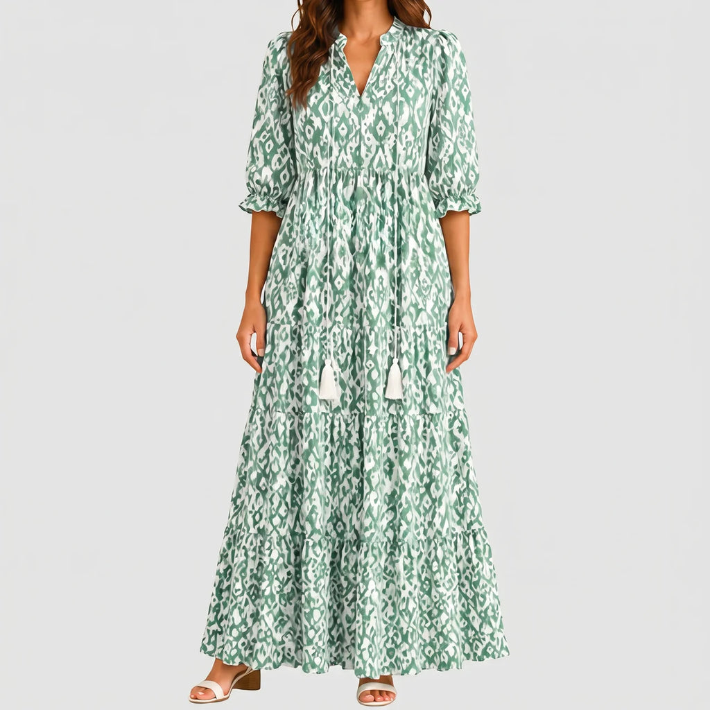 Green boho lightweight maxi dress front view with tiered flowing silhouette and tassel tie detail BELLA HUDSON