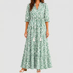 Green boho lightweight maxi dress front view with tiered flowing silhouette and tassel tie detail BELLA HUDSON