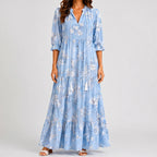 Light blue boho lightweight maxi dress front view with floral print and tassel tie detail BELLA HUDSON