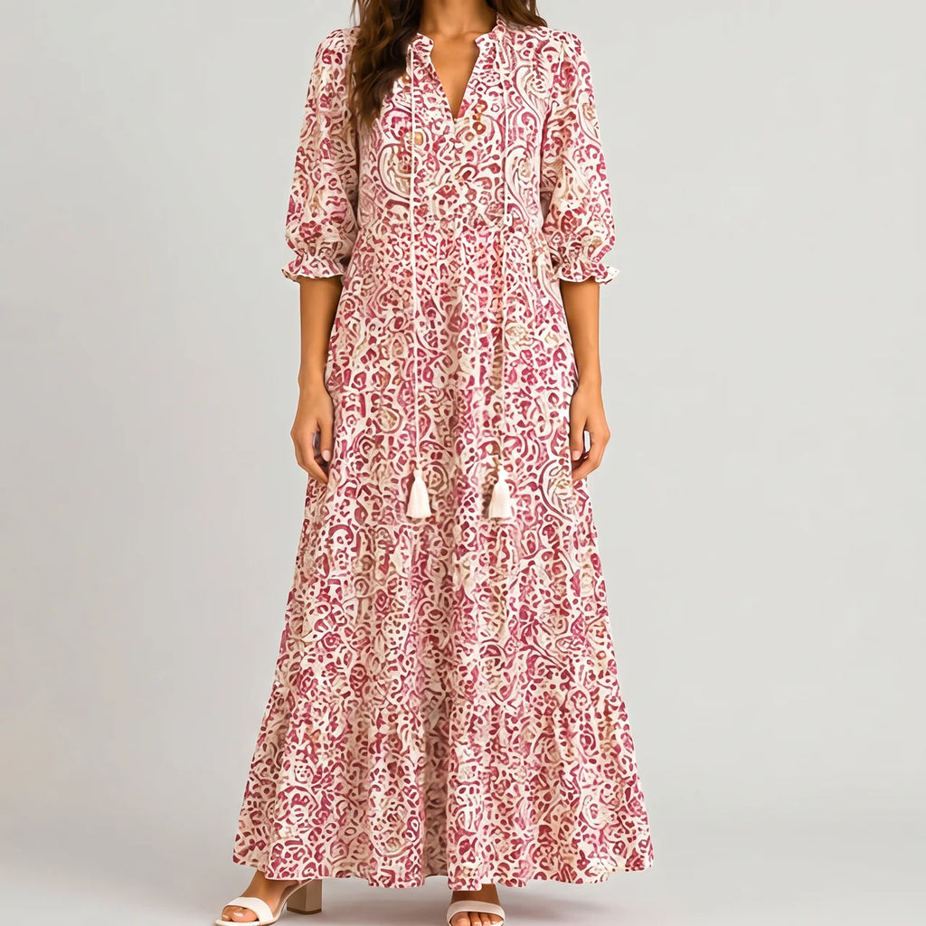 Red boho lightweight maxi dress front view with paisley print and tassel tie detail BELLA HUDSON