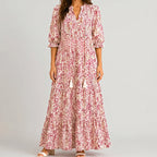 Red boho lightweight maxi dress front view with paisley print and tassel tie detail BELLA HUDSON