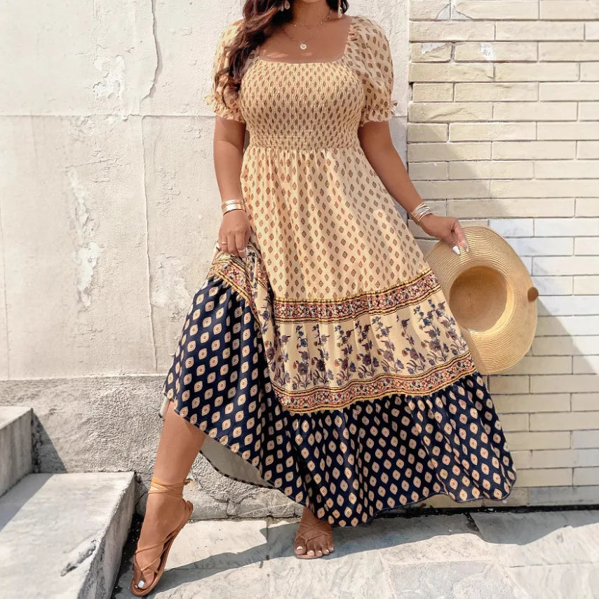 Lifestyle view of the Briar Smocked Dress Bohemian Puff-Sleeve Tiered in yellow, showcasing the flowing tiered skirt, bohemian print hem, and feminine maxi silhouette. Designed by Bella Hudson.