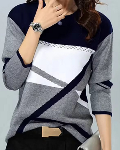 Brielle Black geometric colorblock top with contrasting diagonal panels and relaxed silhouette