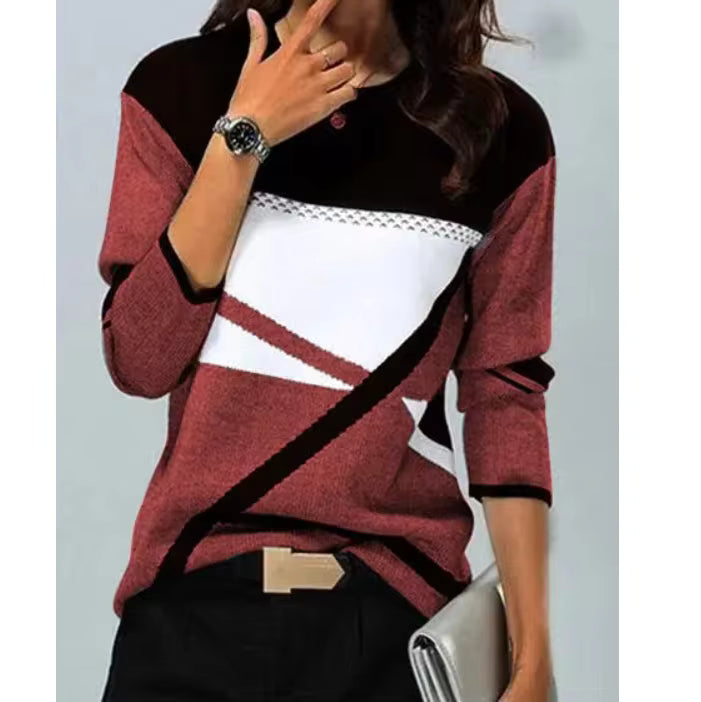 Brielle geometric colorblock top with crew neckline, long sleeves, and diagonal contrast panels