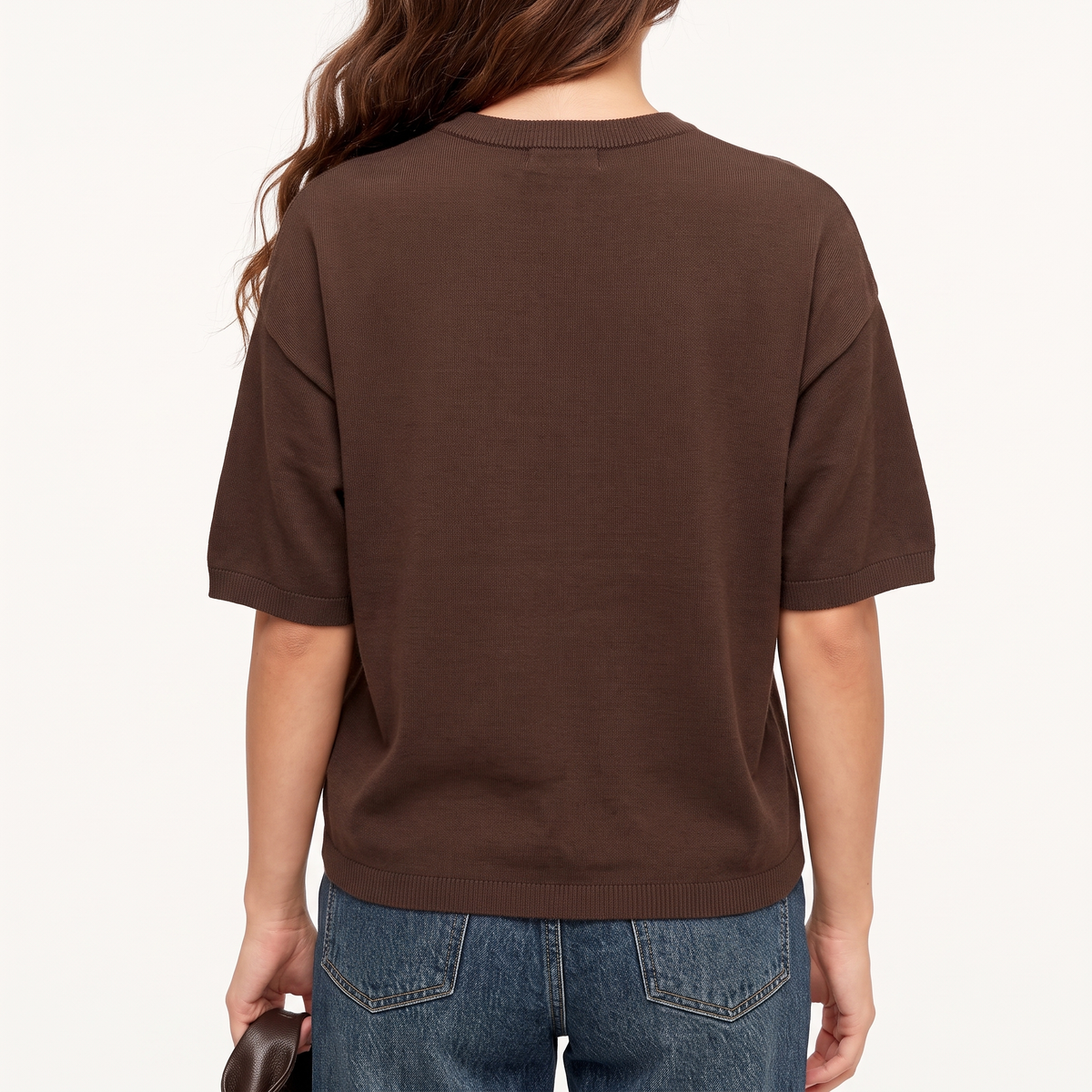 Briony Brown knit T-shirt shown from the back, with a ribbed crew neckline, short sleeves, and boxy fit.
