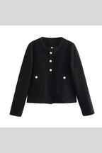 Cadence Black cropped tweed jacket laid flat showing gold buttons and two patch pockets.