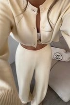 Camille Beige knit cardigan lounge set close-up highlighting the round neckline, button-front closure, long sleeves, and coordinated pants