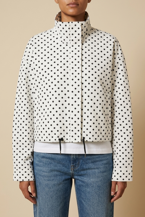 Front view of the white Camille Polka-Dot High-Neck Bomber Jacket for Women featuring polka-dot print, high neck, and zip-through front.