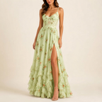 Front view of the Camille Maxi Dress Floral-Print Ruffle Side-Slit in Green, featuring a vibrant floral print, ruffle details, and elegant maxi silhouette. Designed by Bella Hudson.