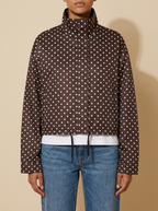 Front view of the brown Camille Polka-Dot High-Neck Bomber Jacket for Women featuring a zip-through front, high neck, and dot print.