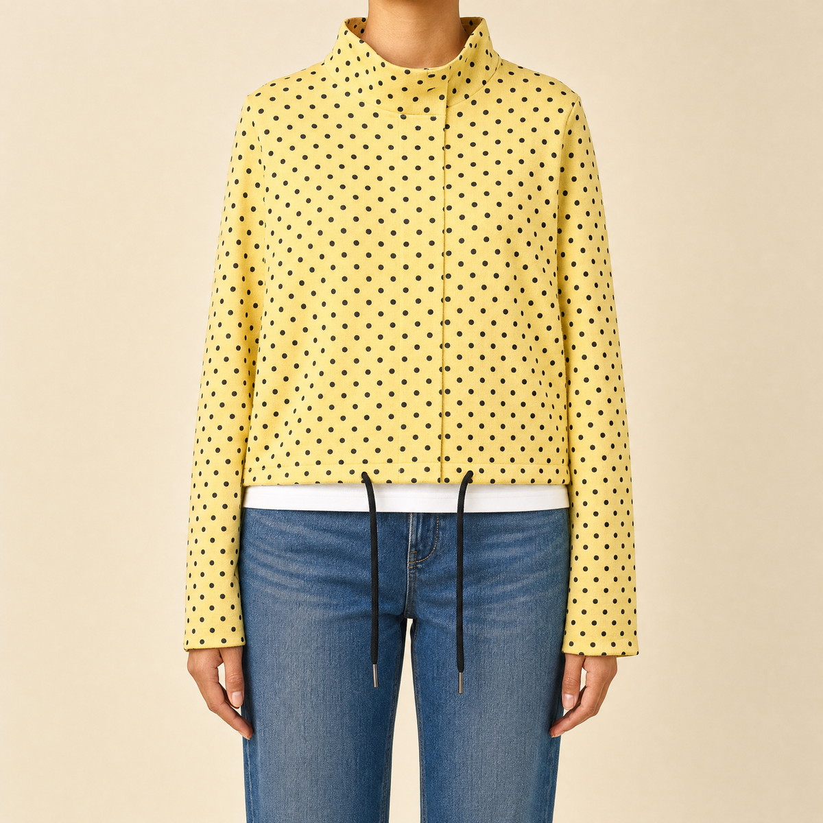 Front view of the yellow Camille Polka-Dot High-Neck Bomber Jacket for Women featuring a high neck, long sleeves, and dot print.