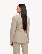 Camille Taupe blazer shown from the back with structured shoulders and buttoned sleeve cuffs.