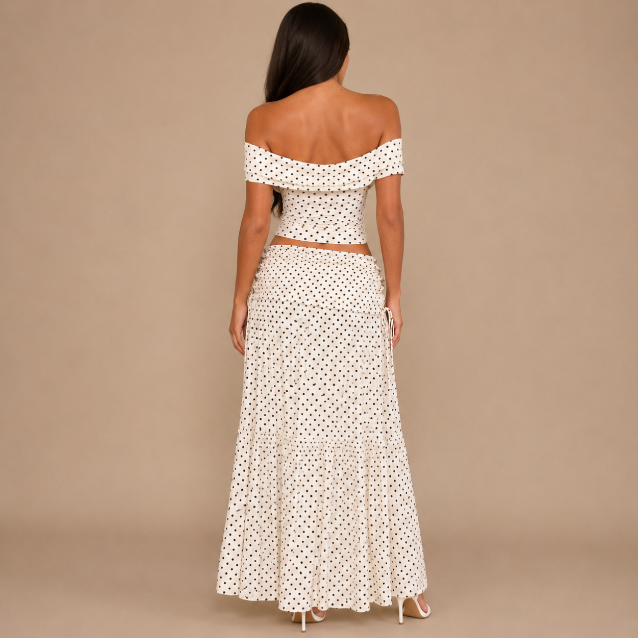 Back view of the Candice Polka Dot Skirt and Off-the-Shoulder Top Set with matching polka dot design. Designed by Bella Hudson.