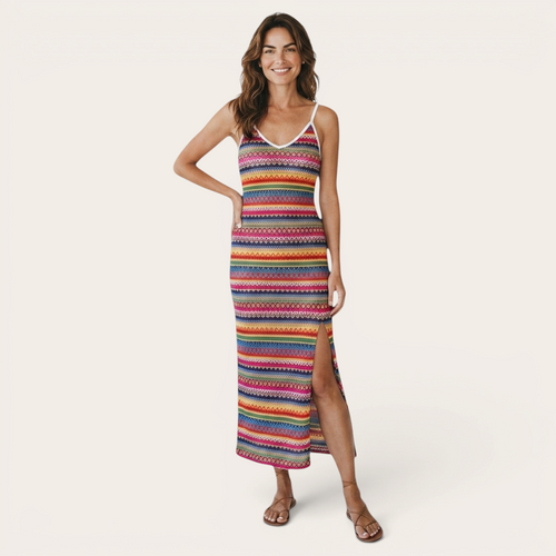 Front view of the Cassia Maxi Dress Knit Striped Cami Side-Slit in pink, featuring a sleeveless cami neckline, colorful knit stripes, body-skimming silhouette, and a side slit. Designed by Bella Hudson.