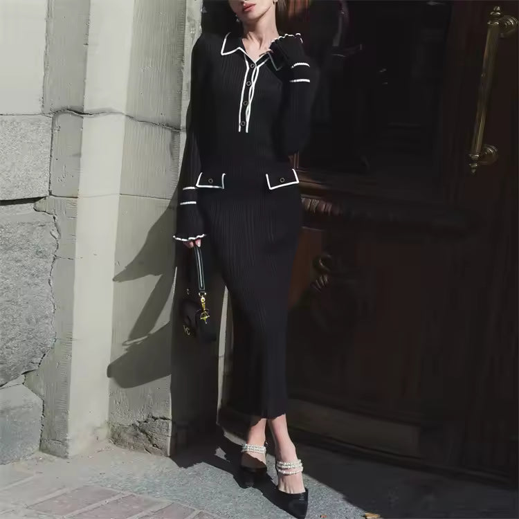 Celine black ribbed knit mini dress with contrast trim, fitted waist, and gently flared hem