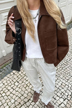 Celine Brown faux suede utility jacket worn over a white tee, showing the chest pocket, zip and snap cuff.
