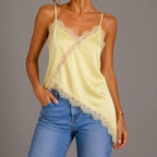 Front view of yellow satin lace V-neck sleeveless top with asymmetrical hem design by BELLA HUDSON