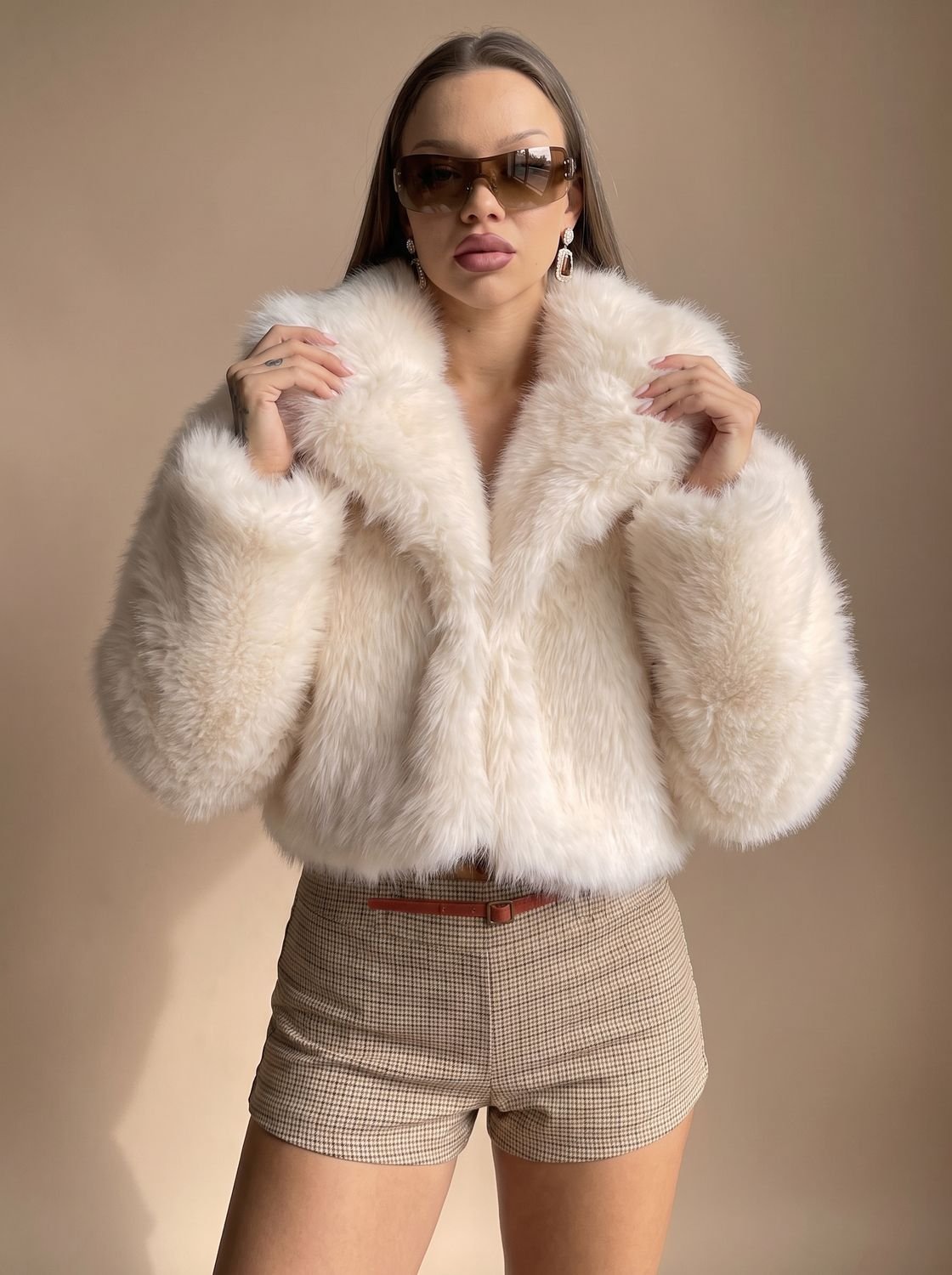 Charlotte Beige cropped faux-fur jacket styled with a relaxed open front, wide lapel collar, oversized sleeves, and short silhouette