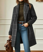 Charlotte Gray long plaid coat featuring a classic windowpane pattern, wide notched lapels, relaxed open-front design, and long sleeves