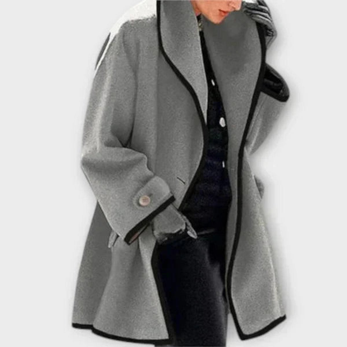 Claire Gray oversized swing coat featuring contrast edging, a structured shawl collar, long sleeves, and a relaxed silhouette
