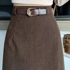 Clara Brown corduroy midi skirt close-up showing textured fabric and belt