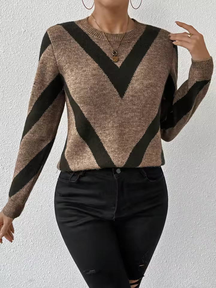 Clara Brown crewneck sweater with geometric chevron design, styled with pants