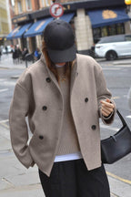 Clara Taupe double-breasted stand-collar jacket with a relaxed fit, dropped shoulders, long sleeves, and button-front design