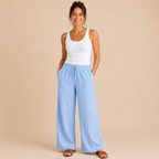 Front view of the Cleo Lightweight Linen Wide-Leg Summer Pants in blue, featuring a relaxed wide-leg silhouette and breathable linen fabric. Designed by Bella Hudson.