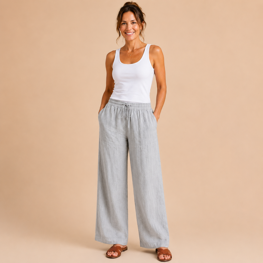 Front view of the Cleo Lightweight Linen Wide-Leg Summer Pants in gray, featuring a relaxed wide-leg silhouette and breathable linen fabric. Designed by Bella Hudson.