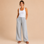 Front view of the Cleo Lightweight Linen Wide-Leg Summer Pants in gray, featuring a relaxed wide-leg silhouette and breathable linen fabric. Designed by Bella Hudson.