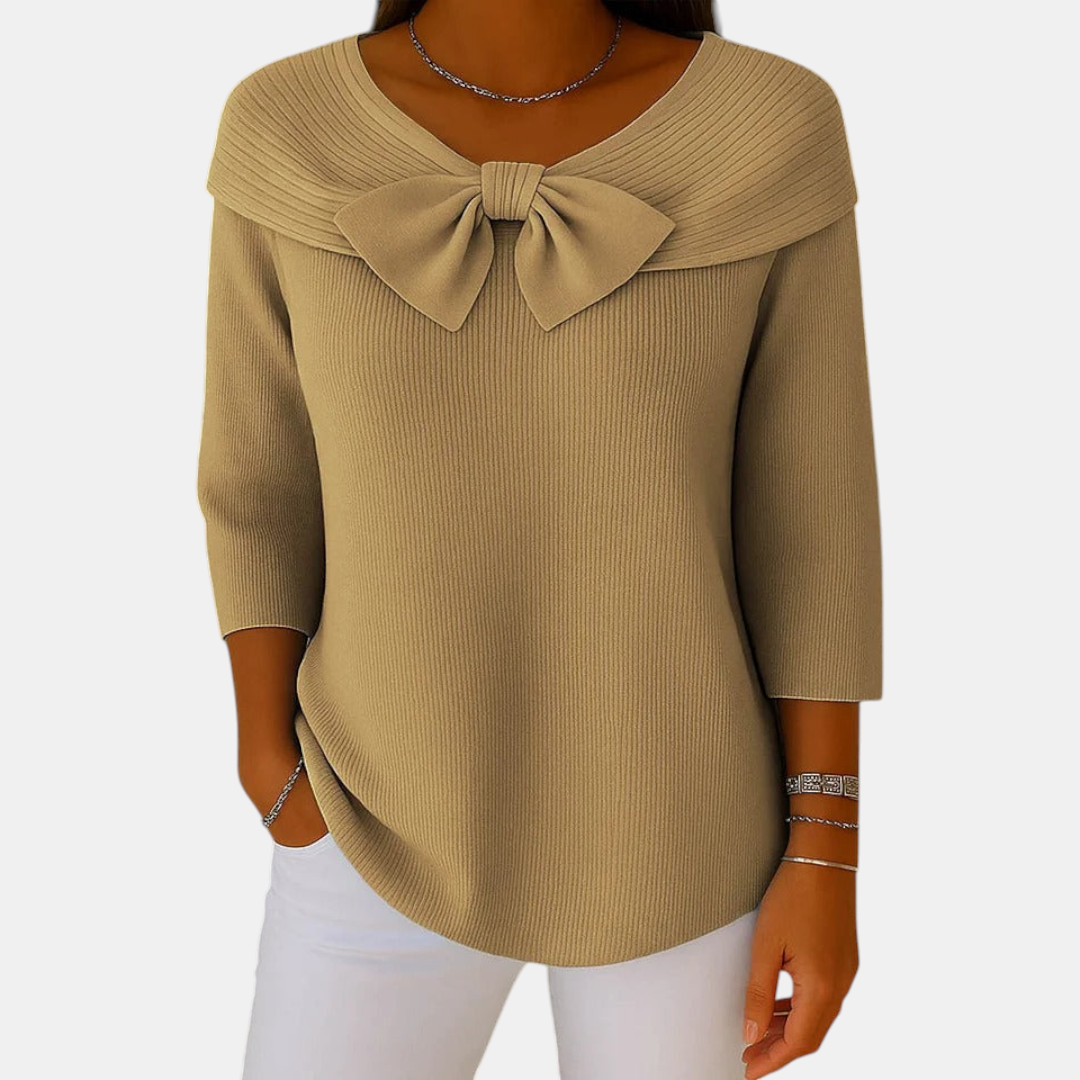 Front view of the Colette Bow-Tie Long Sleeve T-shirt in khaki, featuring a bow neckline, ribbed knit texture, three-quarter sleeves, and a relaxed everyday fit. Designed by Bella Hudson.