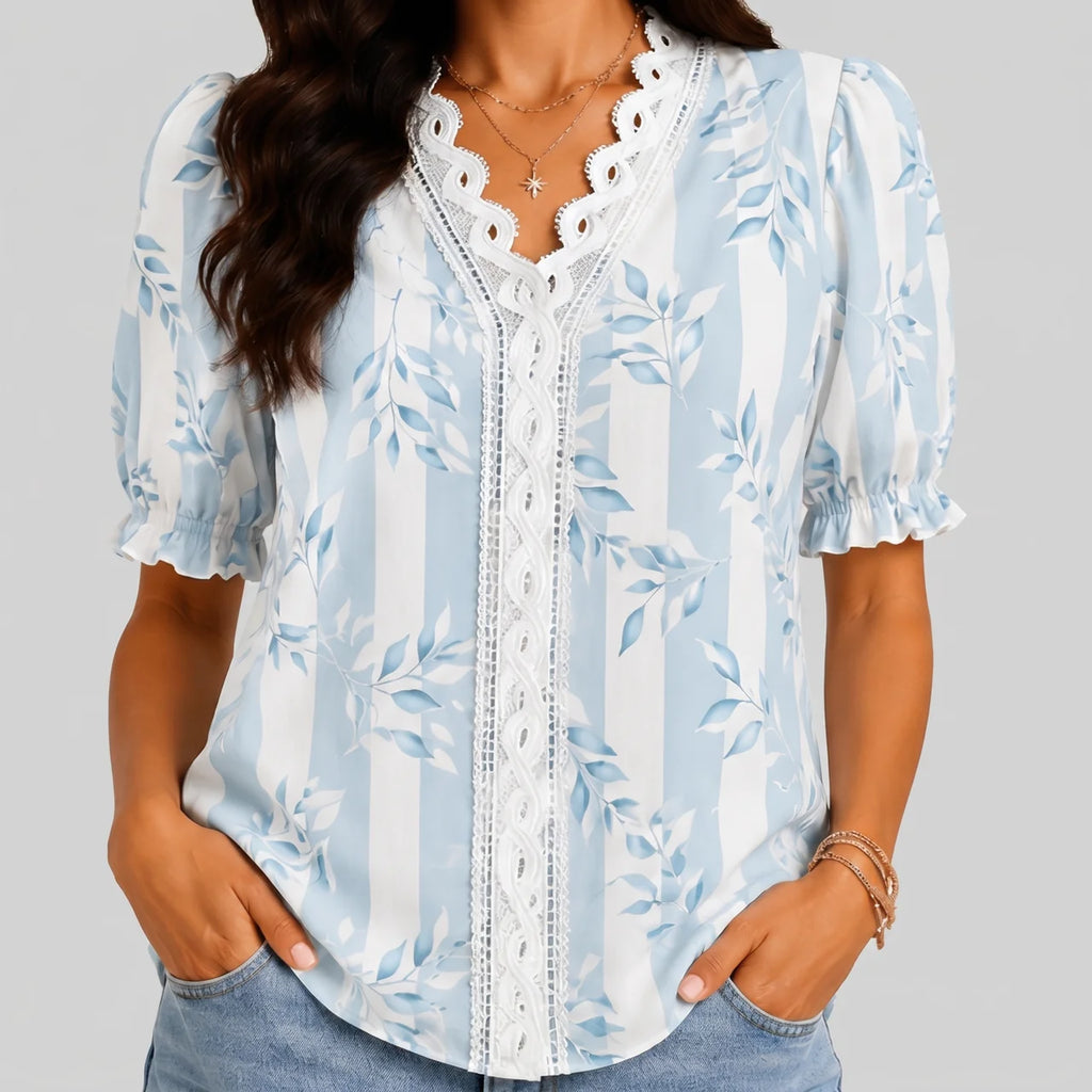 Front view of cyan floral button blouse with short sleeves and relaxed fit by BELLA HUDSON