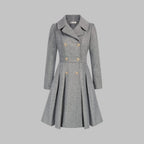 Dahlia Gray A-line coat featuring notched lapels, double-breasted buttons, a defined waist, long sleeves, and a pleated flared hem